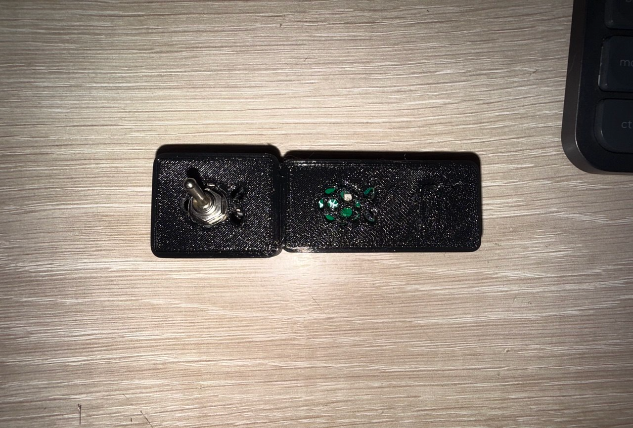 Closed switch enclosure next to a bluetooth keyboard